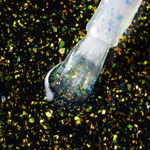 elarto_top_dry_top_gold_flakes_closeup.webp