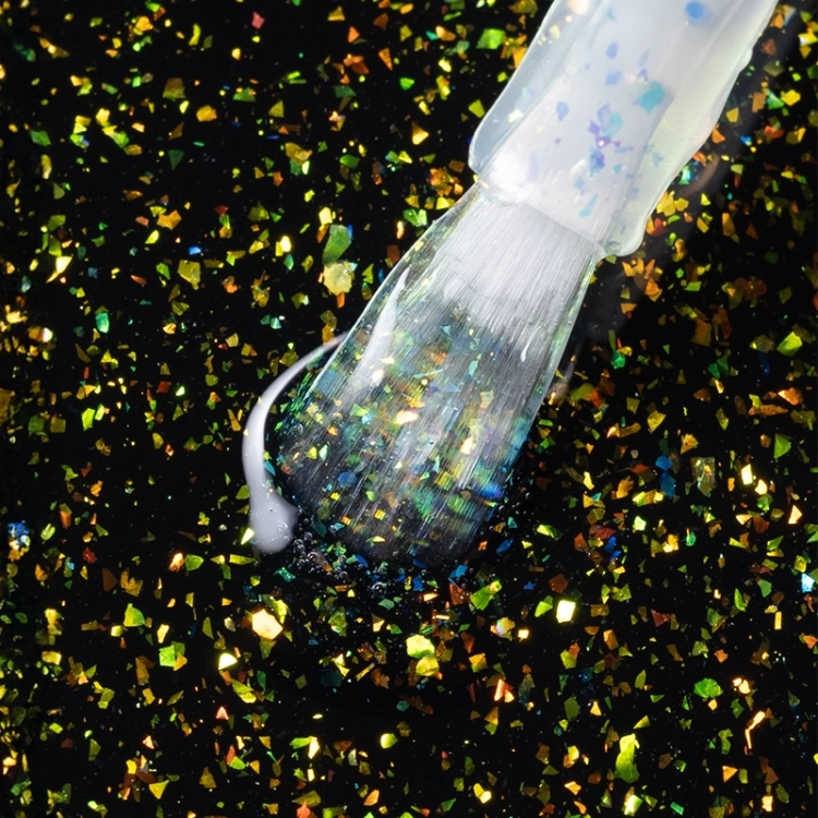 elarto_top_dry_top_gold_flakes_closeup.webp